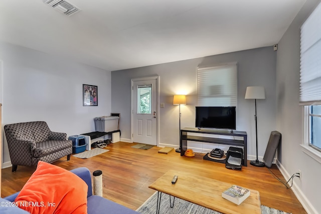 1131 Wycoff Ave, Jacksonville, FL 32205 - living area with wood finished floors and baseboards