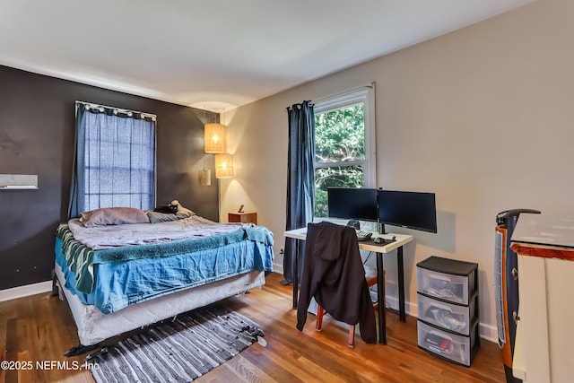 1131 Wycoff Ave, Jacksonville, FL 32205 - bedroom featuring wood finished floors and baseboards