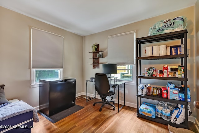 1131 Wycoff Ave, Jacksonville, FL 32205 - home office featuring healthy amount of natural light, wood finished floors, and baseboards