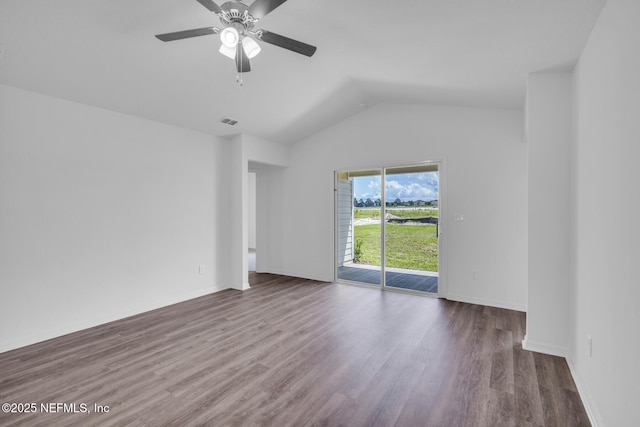 37132 Whippoorwill Ct, Hilliard, FL 32046 - empty room with vaulted ceiling, a ceiling fan, wood finished floors, and baseboards