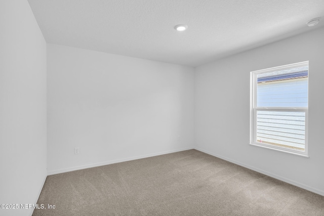 37132 Whippoorwill Ct, Hilliard, FL 32046 - empty room featuring carpet flooring, baseboards, and recessed lighting