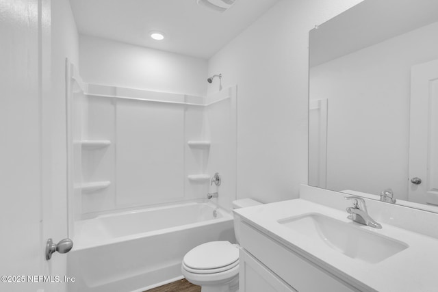 37132 Whippoorwill Ct, Hilliard, FL 32046 - bathroom with vanity, shower / tub combination, toilet, and wood finished floors