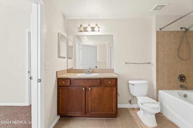 8550 Touchton Rd Unit 122, Jacksonville, FL 32216 - full bath featuring toilet, vanity, bathtub / shower combination, tile patterned floors, and baseboards