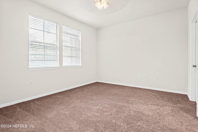 8550 Touchton Rd Unit 122, Jacksonville, FL 32216 - carpeted empty room featuring baseboards and ceiling fan
