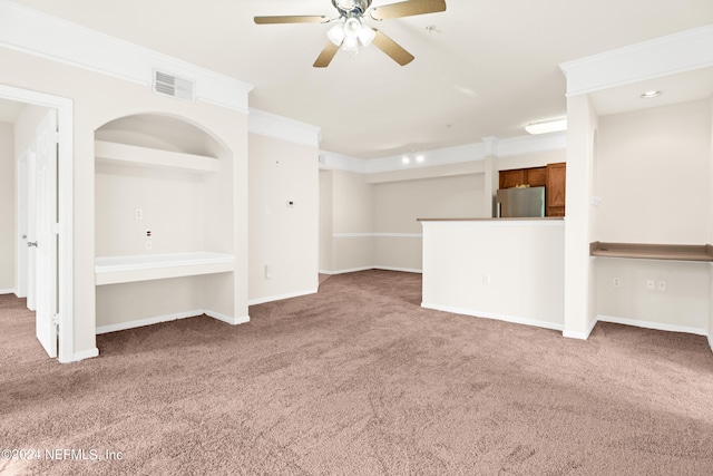 8550 Touchton Rd Unit 122, Jacksonville, FL 32216 - unfurnished living room featuring carpet, ceiling fan, crown molding, and baseboards
