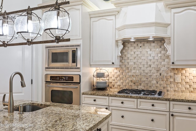 2435 Den St, Saint Augustine, FL 32092 - kitchen with a sink, appliances with stainless steel finishes, custom exhaust hood, and decorative backsplash