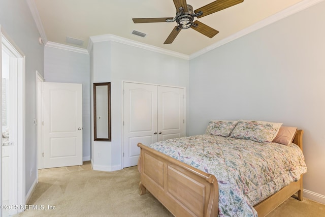 2435 Den St, Saint Augustine, FL 32092 - bedroom featuring light colored carpet, baseboards, ornamental molding, a closet, and a ceiling fan