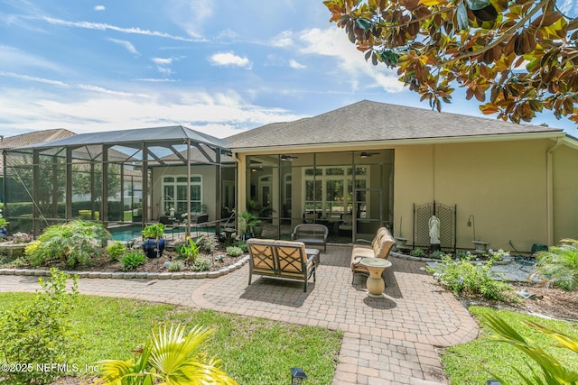 2435 Den St, Saint Augustine, FL 32092 - view of patio featuring a ceiling fan, an outdoor living space, an outdoor pool, and glass enclosure