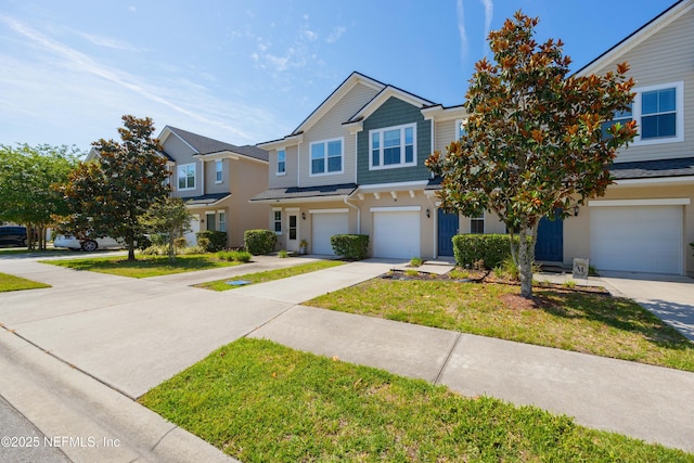 246 Moultrie Village Ln, Saint Augustine, FL 32086 - multi unit property featuring a garage, driveway, a front lawn, and stucco siding