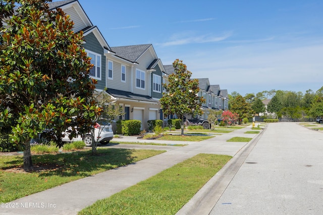 246 Moultrie Village Ln, Saint Augustine, FL 32086 - view of asphalt street featuring a residential view and sidewalks