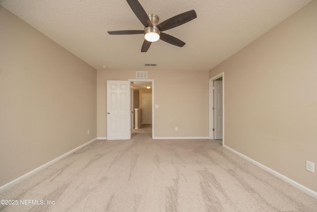 246 Moultrie Village Ln, Saint Augustine, FL 32086 - unfurnished room featuring ceiling fan, carpet floors, baseboards, and a textured ceiling