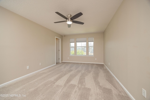 246 Moultrie Village Ln, Saint Augustine, FL 32086 - spare room featuring ceiling fan, light carpet, baseboards, and a textured ceiling