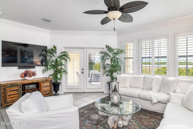 2315 Vista Cove Rd, Saint Augustine, FL 32084 - living room with tile patterned floors, french doors, ornamental molding, and a ceiling fan