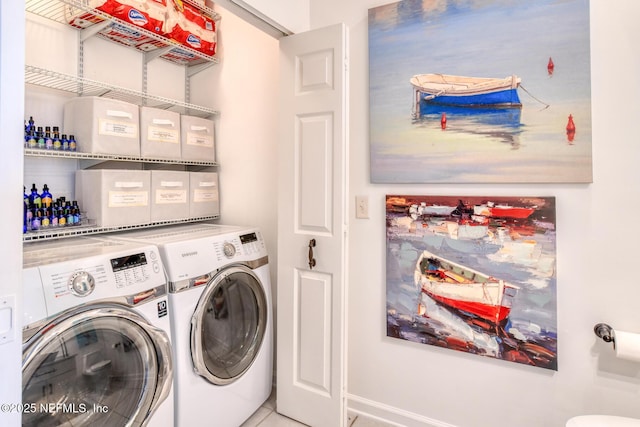 2315 Vista Cove Rd, Saint Augustine, FL 32084 - laundry room with separate washer and dryer and baseboards
