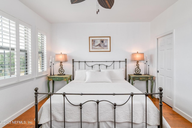 2315 Vista Cove Rd, Saint Augustine, FL 32084 - bedroom featuring multiple windows, baseboards, and wood finished floors