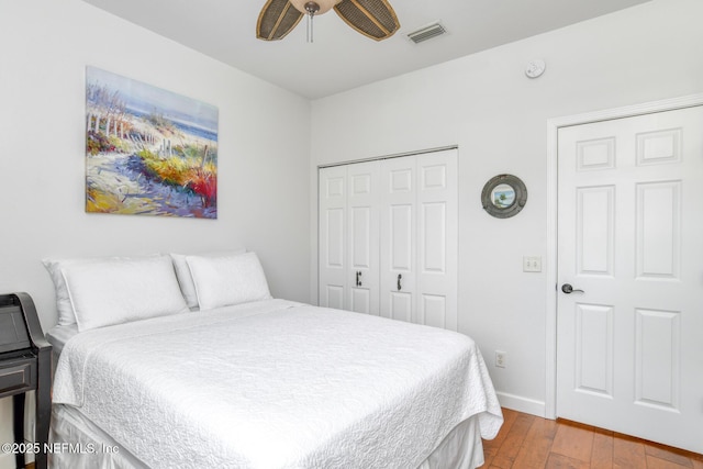 2315 Vista Cove Rd, Saint Augustine, FL 32084 - bedroom with hardwood / wood-style flooring, a closet, ceiling fan, and baseboards