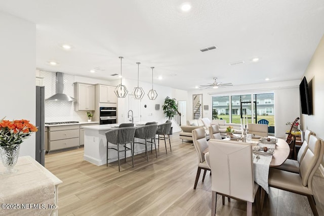 217 Silver Myrtle Ct, Saint Augustine, FL 32092 - dining space featuring light wood-style floors, ceiling fan, and recessed lighting