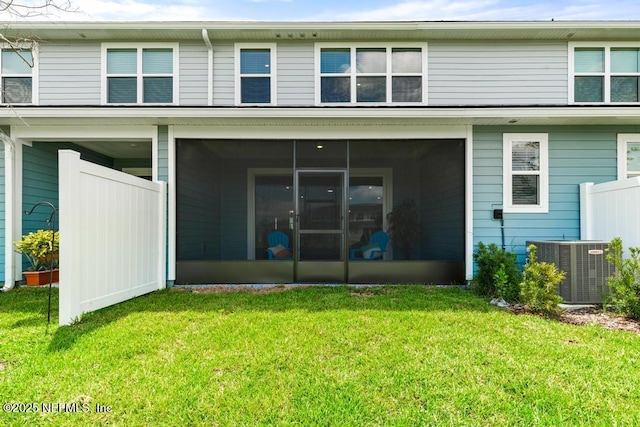217 Silver Myrtle Ct, Saint Augustine, FL 32092 - rear view of property featuring a sunroom, central AC, and a yard