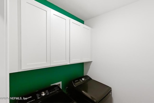 217 Silver Myrtle Ct, Saint Augustine, FL 32092 - laundry area featuring cabinet space and washing machine and clothes dryer