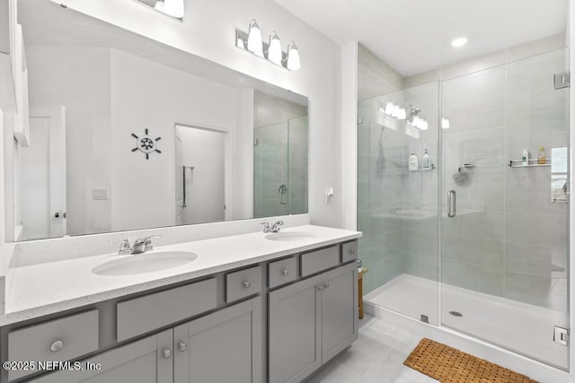 217 Silver Myrtle Ct, Saint Augustine, FL 32092 - bathroom featuring double vanity, a stall shower, and tile patterned floors
