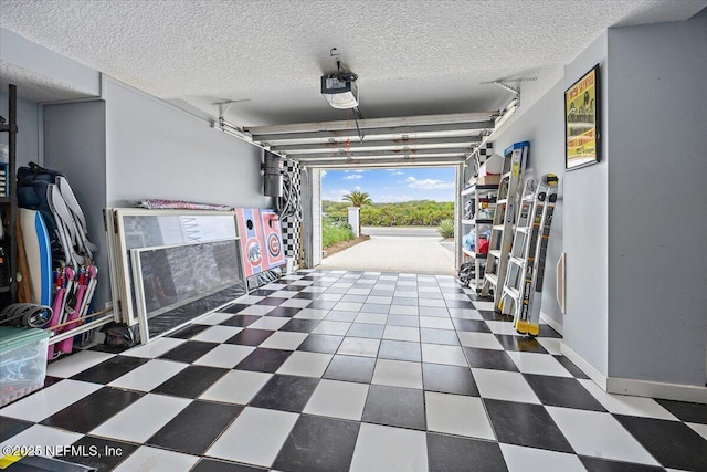 2943 S Ponte Vedra Blvd, Ponte Vedra Beach, FL 32082 - garage featuring a garage door opener and baseboards