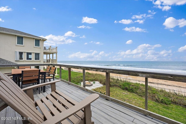 2943 S Ponte Vedra Blvd, Ponte Vedra Beach, FL 32082 - wooden deck featuring outdoor dining space and view of water and beach