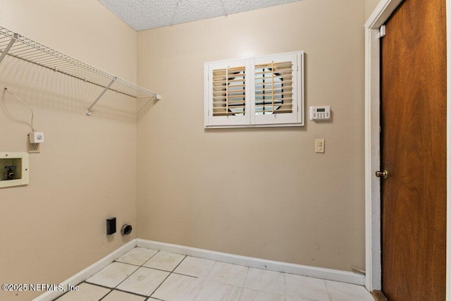 550 Roberts Rd, Saint Johns, FL 32259 - washroom featuring electric dryer hookup, light tile patterned flooring, washer hookup, and baseboards