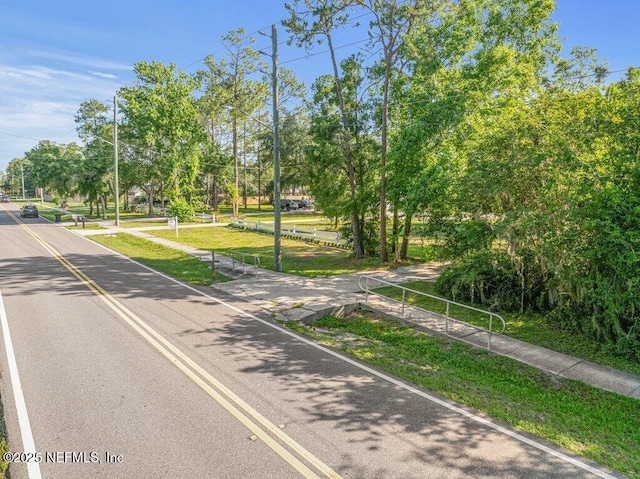 550 Roberts Rd, Saint Johns, FL 32259 - view of asphalt road with view of wooded area
