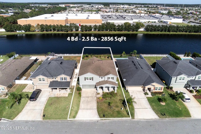 12237 Woodview Dr, Jacksonville, FL 32246 - aerial view of residential area featuring a large body of water and property boundaries highlighted