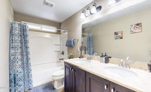 12237 Woodview Dr, Jacksonville, FL 32246 - bathroom featuring toilet, shower / bath combo, and double vanity