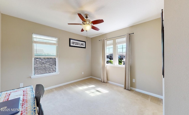 12237 Woodview Dr, Jacksonville, FL 32246 - carpeted empty room with a ceiling fan and baseboards