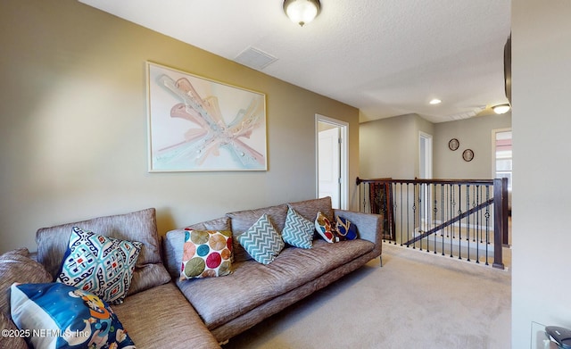 12237 Woodview Dr, Jacksonville, FL 32246 - carpeted living area featuring a textured ceiling