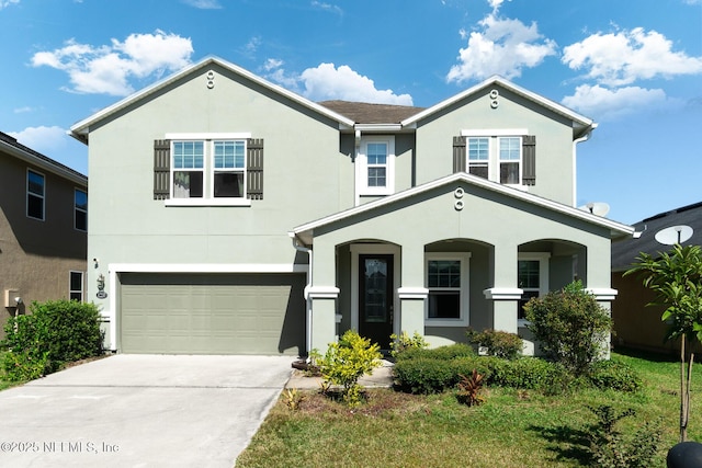 12237 Woodview Dr, Jacksonville, FL 32246 - view of front facade featuring an attached garage, stucco siding, concrete driveway, and covered porch