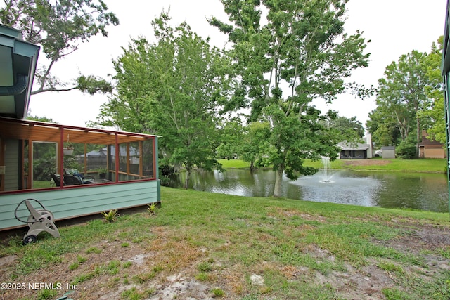 426 Harvest Bend Dr, Fleming Island, FL 32003 - view of grassy yard featuring a water view and a sunroom