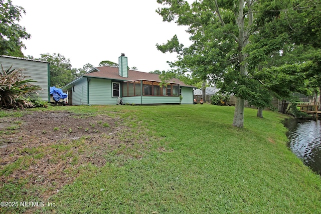 426 Harvest Bend Dr, Fleming Island, FL 32003 - view of yard with a sunroom and a water view