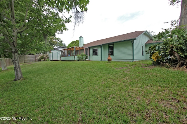426 Harvest Bend Dr, Fleming Island, FL 32003 - rear view of property featuring a sunroom and a chimney