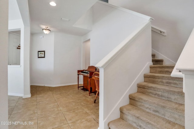 1090 Wetland Ridge Cir, Middleburg, FL 32068 - stairs with tile patterned flooring, baseboards, and recessed lighting