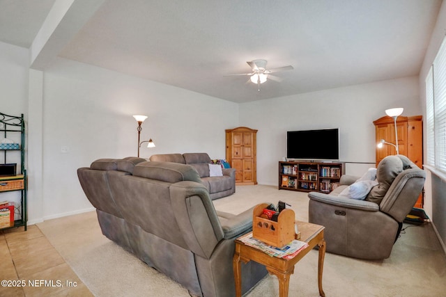 1090 Wetland Ridge Cir, Middleburg, FL 32068 - living area with ceiling fan, light colored carpet, and baseboards