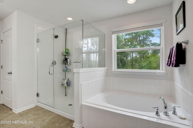 1090 Wetland Ridge Cir, Middleburg, FL 32068 - bathroom featuring a garden tub, a shower stall, recessed lighting, and tile patterned flooring