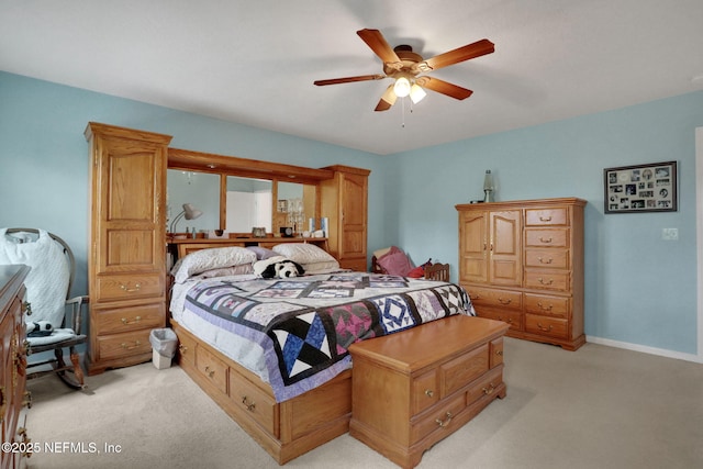 1090 Wetland Ridge Cir, Middleburg, FL 32068 - bedroom with light colored carpet, ceiling fan, and baseboards