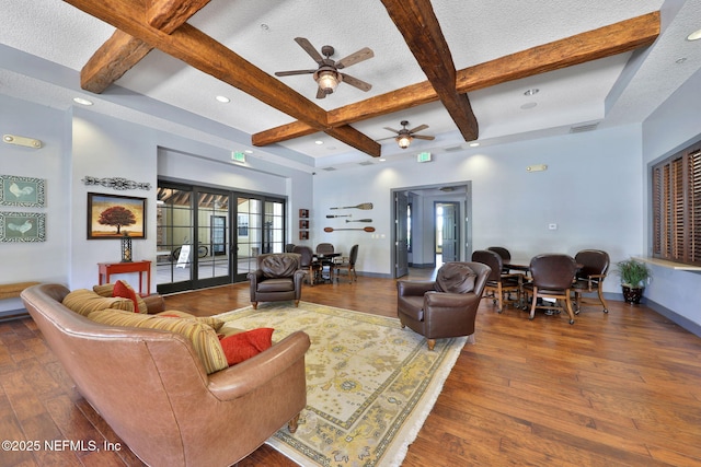 1090 Wetland Ridge Cir, Middleburg, FL 32068 - living area with hardwood / wood-style flooring, coffered ceiling, ceiling fan, beamed ceiling, and baseboards