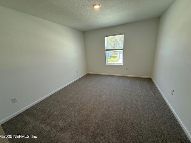 13525 Ute Pl, Jacksonville, FL 32218 - unfurnished room featuring carpet floors, a textured ceiling, and baseboards