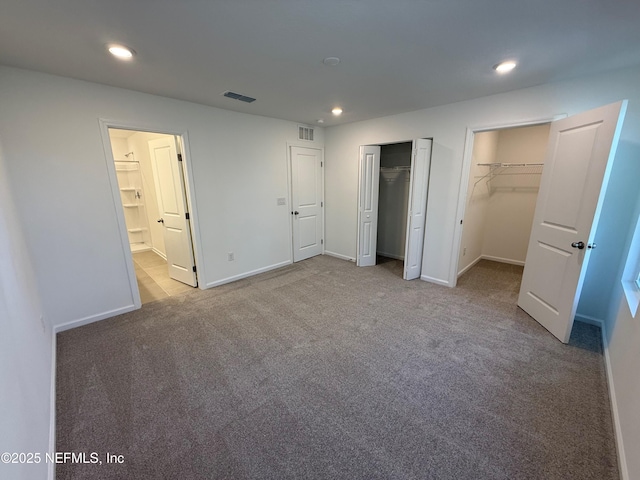 13525 Ute Pl, Jacksonville, FL 32218 - unfurnished bedroom featuring recessed lighting, carpet floors, multiple closets, baseboards, and connected bathroom