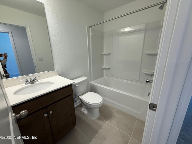 13525 Ute Pl, Jacksonville, FL 32218 - bathroom with vanity, toilet, shower / bath combination, tile patterned floors, and a textured wall