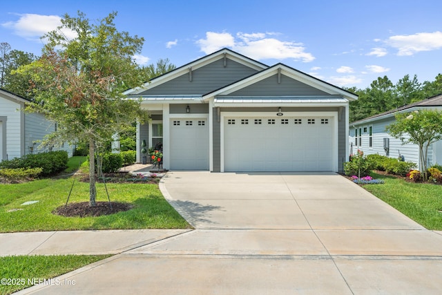 220 Hoptree Pl, Saint Johns, FL 32259 - view of front facade featuring a front yard, driveway, and a garage
