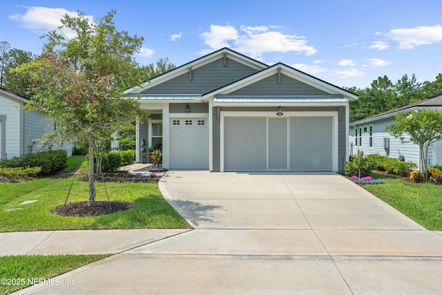 220 Hoptree Pl, Saint Johns, FL 32259 - view of front of house featuring a front yard, driveway, and a garage