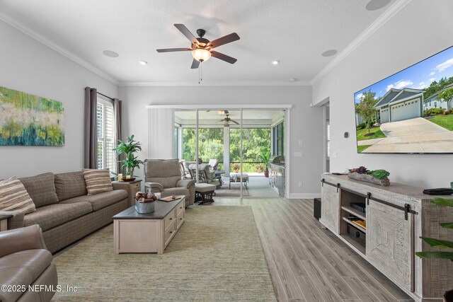 220 Hoptree Pl, Saint Johns, FL 32259 - living area with ceiling fan, light wood finished floors, healthy amount of natural light, ornamental molding, and baseboards