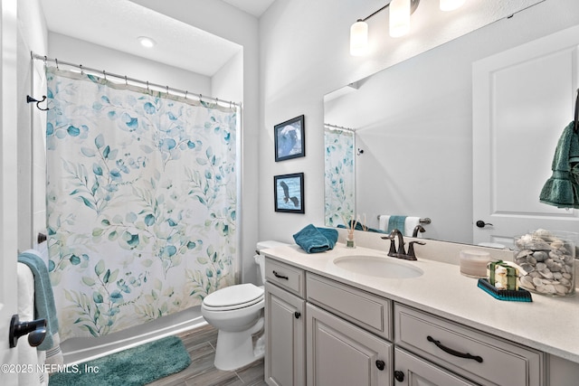 220 Hoptree Pl, Saint Johns, FL 32259 - bathroom featuring vanity, toilet, wood finished floors, and shower / bath combo with shower curtain