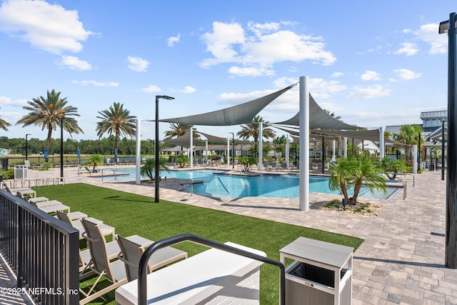 220 Hoptree Pl, Saint Johns, FL 32259 - community pool with a lawn and a patio
