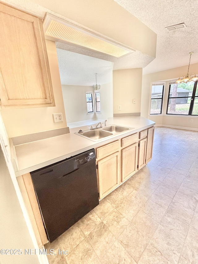 3951 Hunters Lake Cir W, Jacksonville, FL 32210 - kitchen with dishwasher, a chandelier, a sink, a textured ceiling, and light brown cabinetry